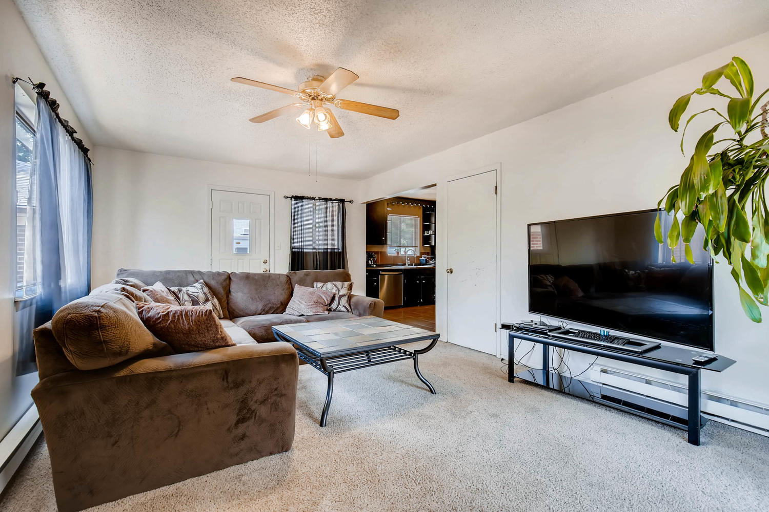 NEW LISTING: 7114 Santa Fe Drive Denver CO Family Room