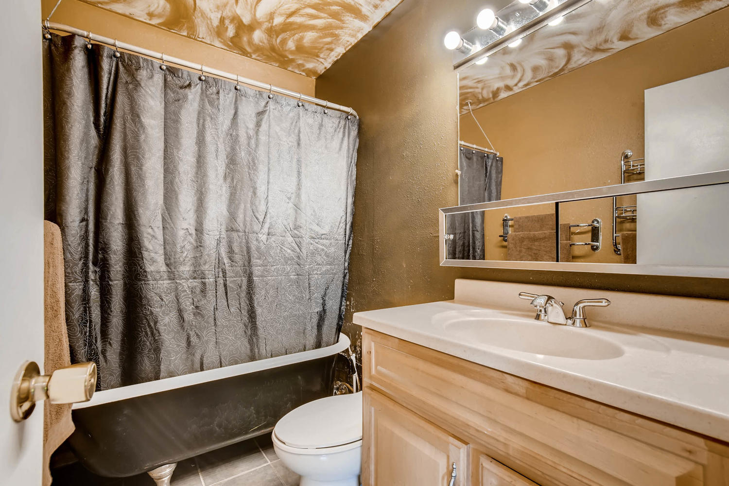 NEW LISTING: 7114 Santa Fe Drive Denver CO Main Bath