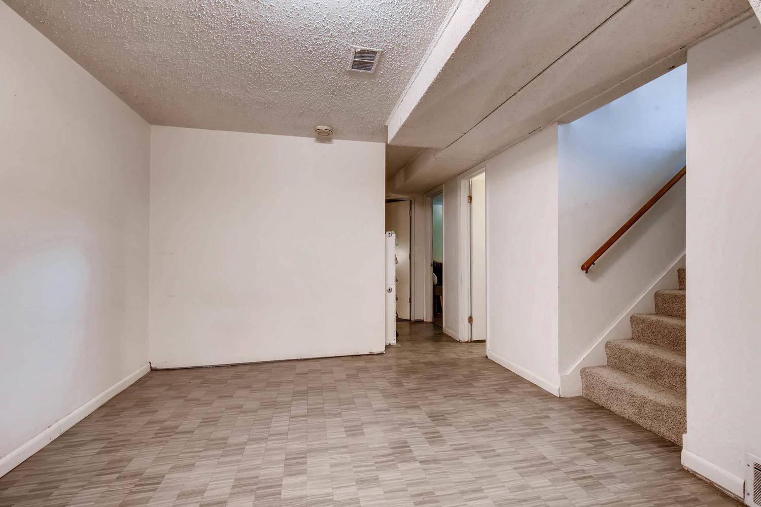 NEW LISTING: 7114 Santa Fe Drive Denver CO Basement Recreation Room