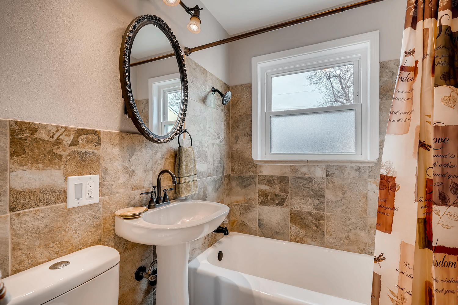 NEW LISTING: 579 S Quivas St Denver CO Updated Bath