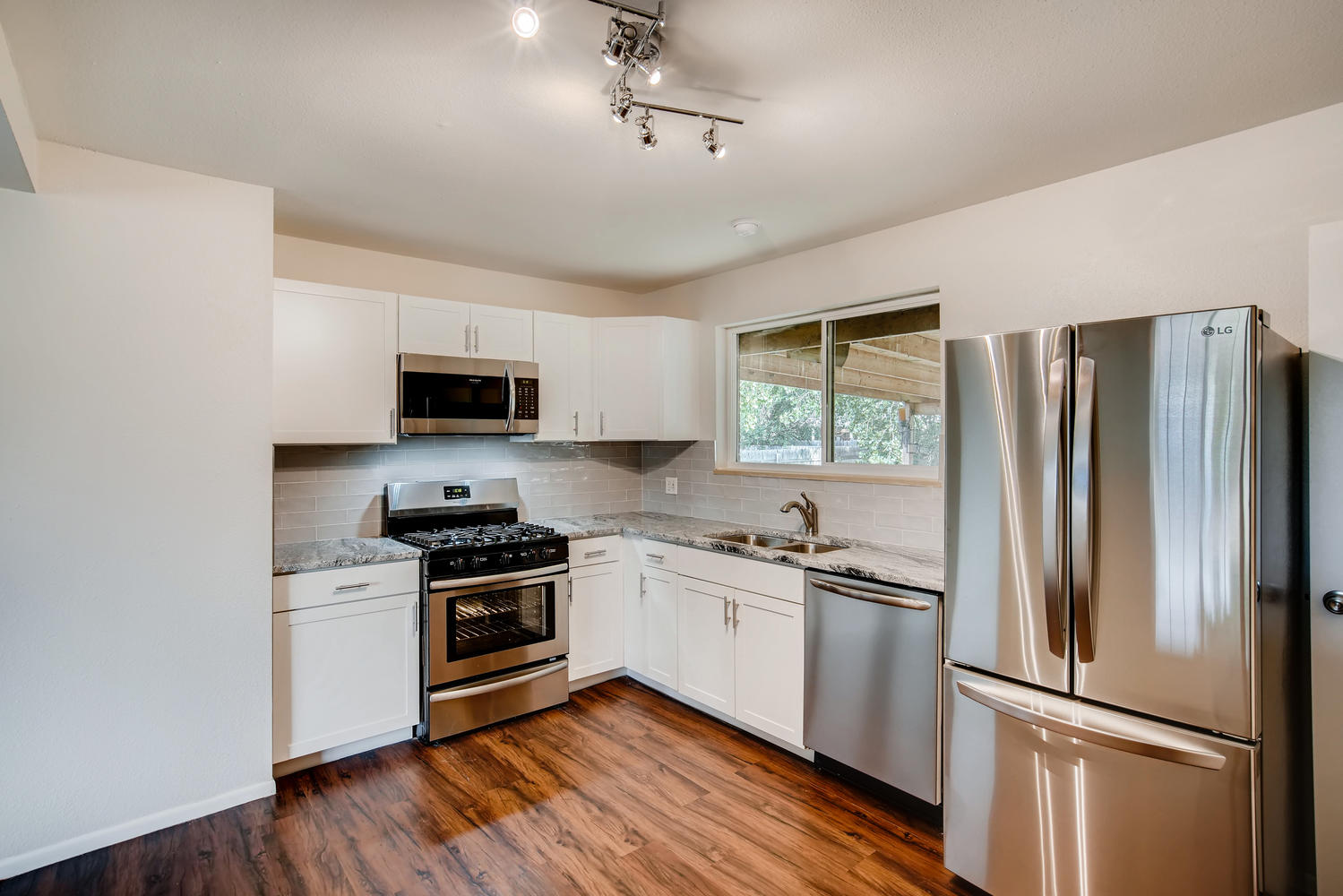 REAL ESTATE LISTING: 13040 Pensacola Place Denver NEW Kitchen