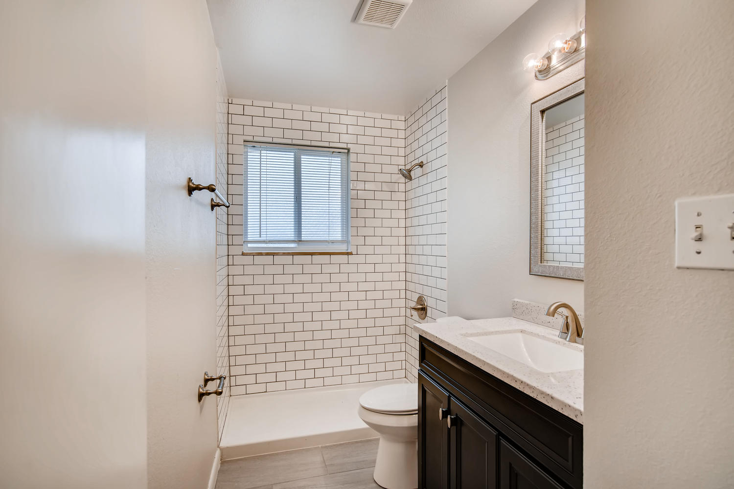 REAL ESTATE LISTING: 13040 Pensacola Place Denver NEW Main Level Bathroom