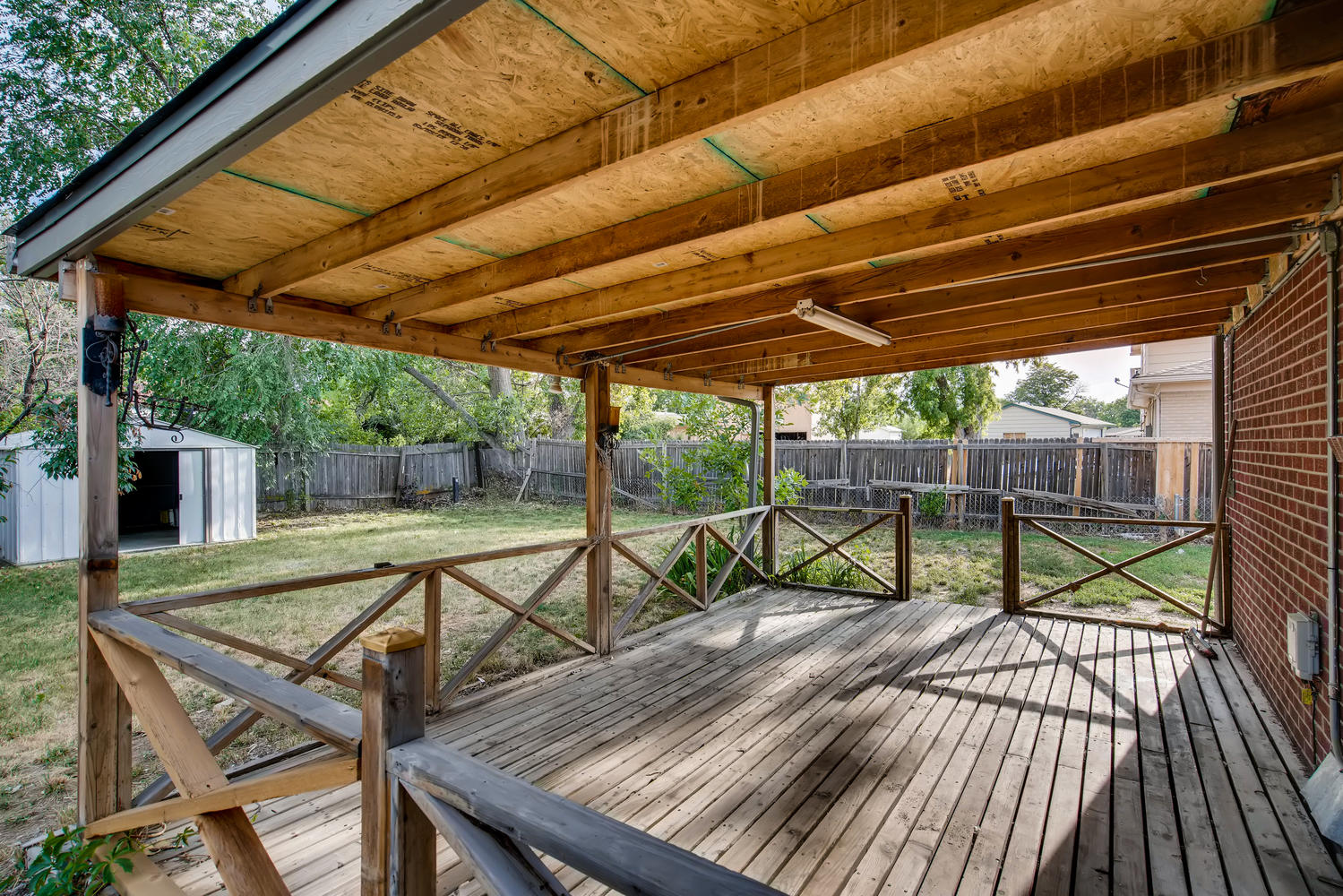 REAL ESTATE LISTING: 13040 Pensacola Place Denver Covered Deck