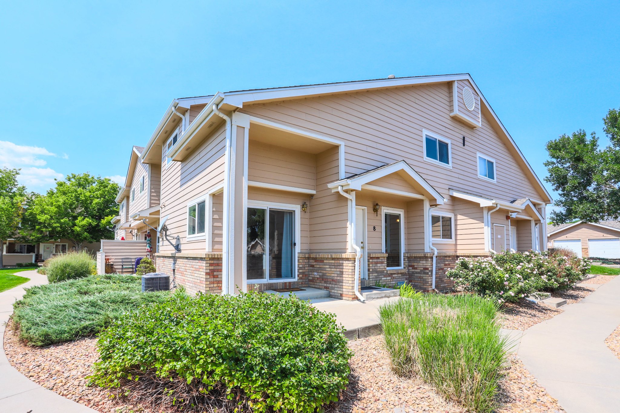 REAL ESTATE LISTING: 1601 Great Western Dr Longmont Corner Condo Unit