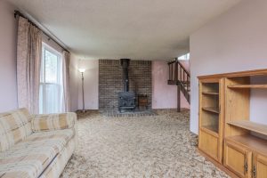 REAL ESTATE LISTING: 1516 Atwood St Longmont Living Room