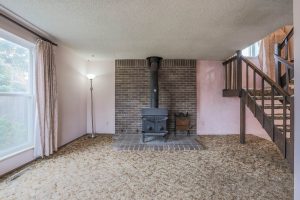 REAL ESTATE LISTING: 1516 Atwood St Longmont Living Room