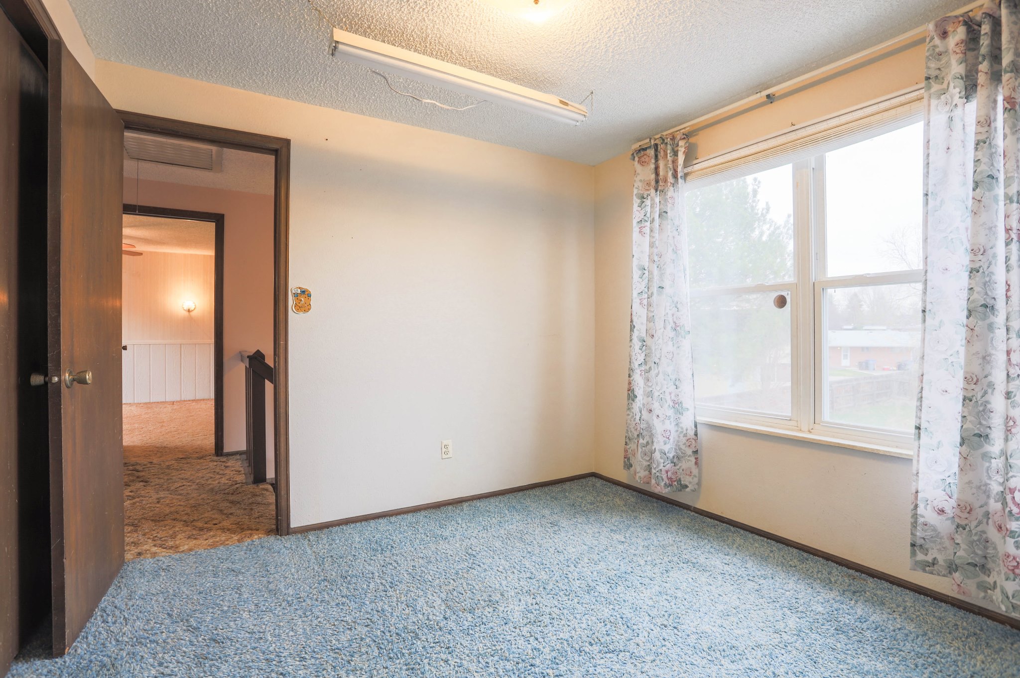REAL ESTATE LISTING: 1516 Atwood St Longmont Bedroom 3
