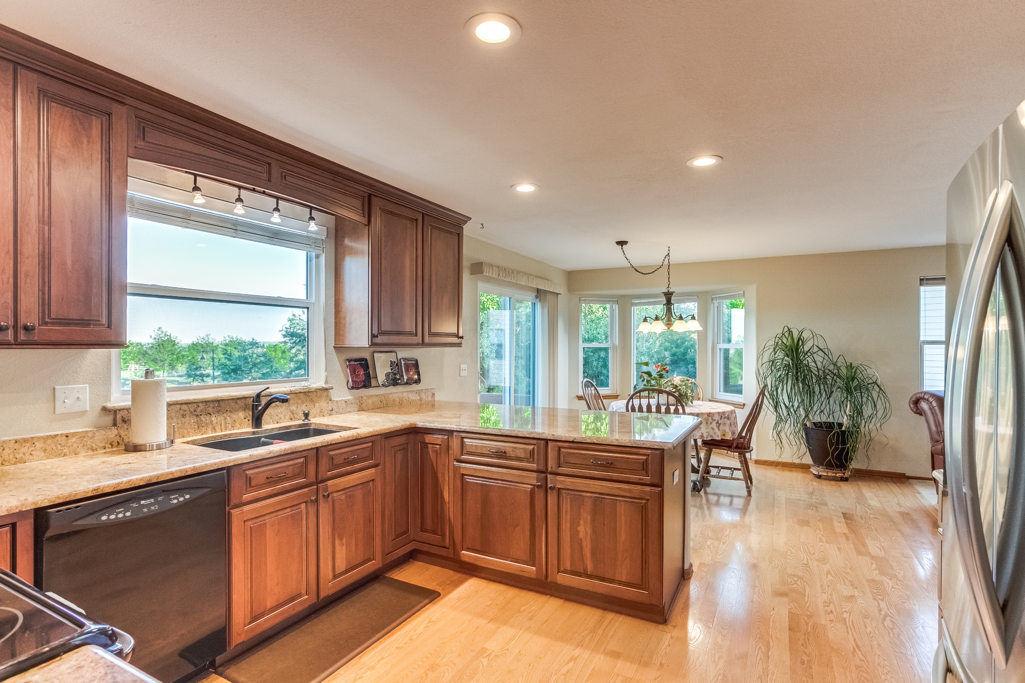 REAL ESTATE LISTING: 1280 Elmwood Ct Broomfield Kitchen Nook and Family Room