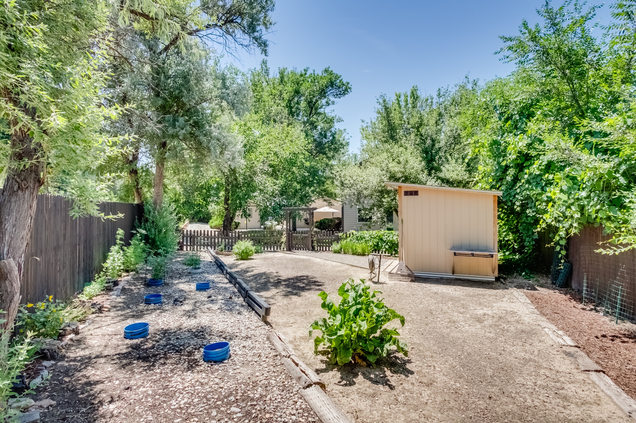 REAL ESTATE LISTING: 461 Verdant Circle Fenced Garden and Shed
