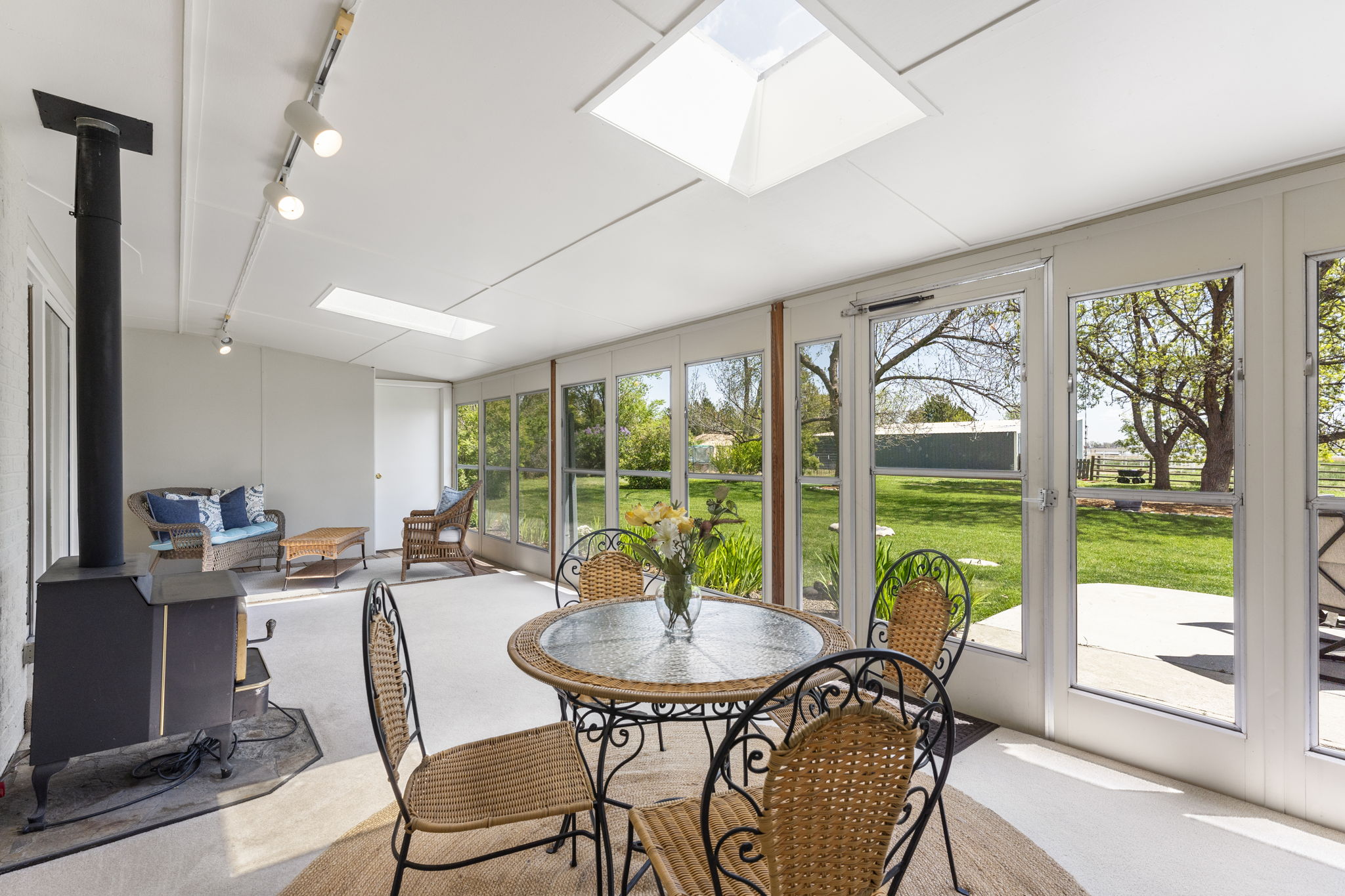 REAL ESTATE LISTING: 12566 County Road 1 Longmont Enclosed Porch